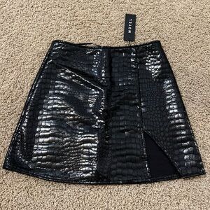 Women’s black mini skirt.